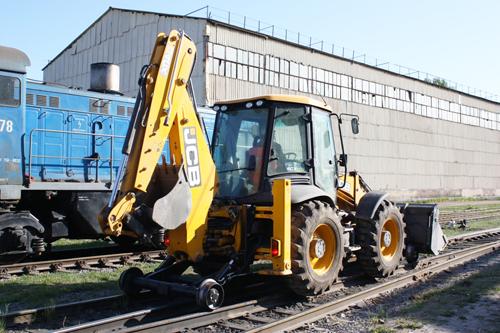 Система железнодорожных колес для экскаватора-погрузчика JCB